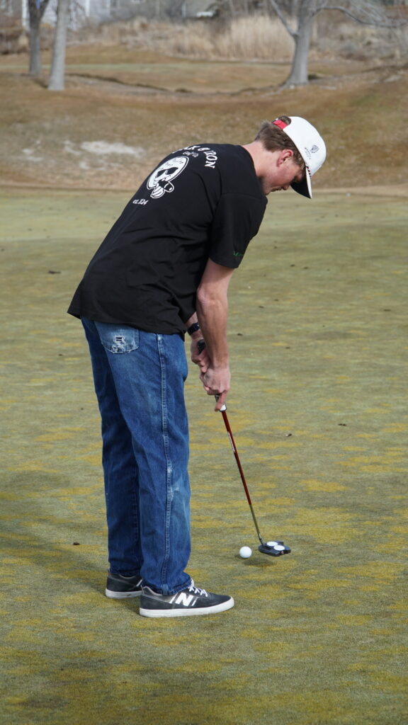 Oak & Iron Golfer Putting with golf style