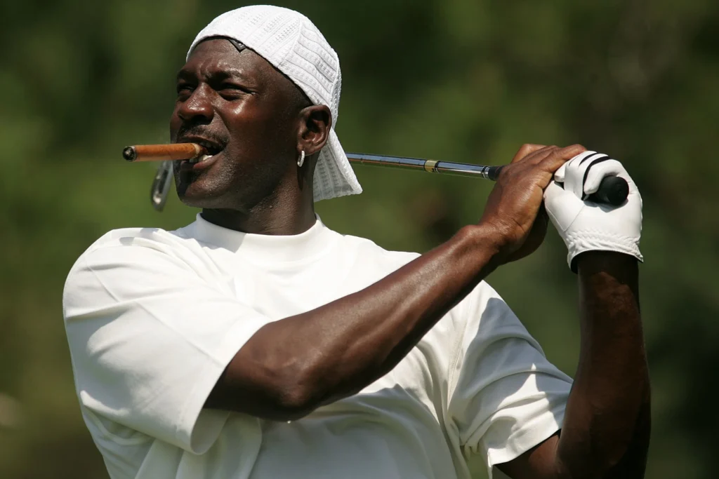 Michael Jordan golf style with a cigar